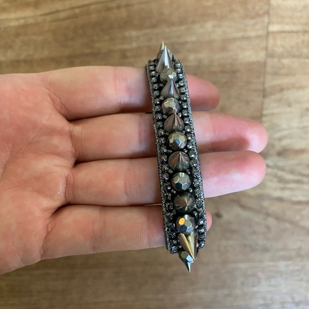 Sophisticated spiked silver cocktail bracelet